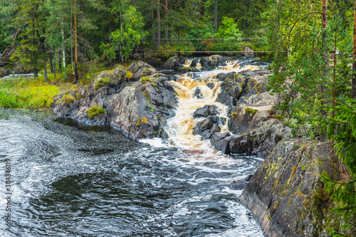 Park with the cascades of Akparhvenkoski waterfalls on the Tokhmayoki River  a popular tourist attraction situated near the settlement Ruskeala in Karelia  Russia