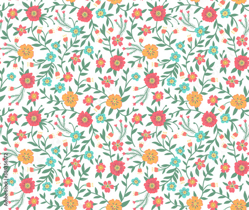 Vintage floral background. Seamless vector pattern for design and fashion prints. Flowers pattern with small red and orange flowers on a white background. Ditsy style.