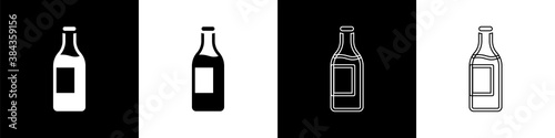 Set Wine bottle icon isolated on black and white background. Vector.