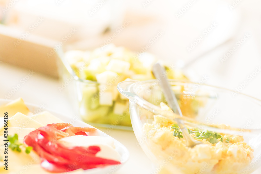 Breakfast table - butter, egg and mayo sandwich filling, sliced peppers Breakfast table - butter, egg and mayo sandwich filling, sliced peppers