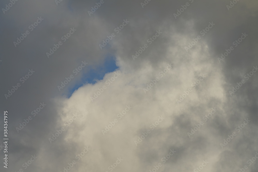 Clouds with some blue sky in the background Clouds with some blue sky in the background
