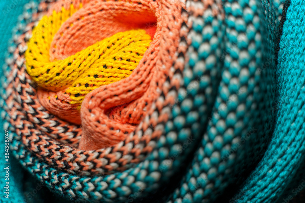 Smooth folded multi colored knitted fabrics Smooth folded multi colored knitted fabrics