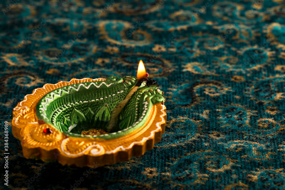 Indian Festival Diwali , oil lamp on dark background