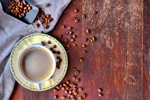 cup of coffee with beans	