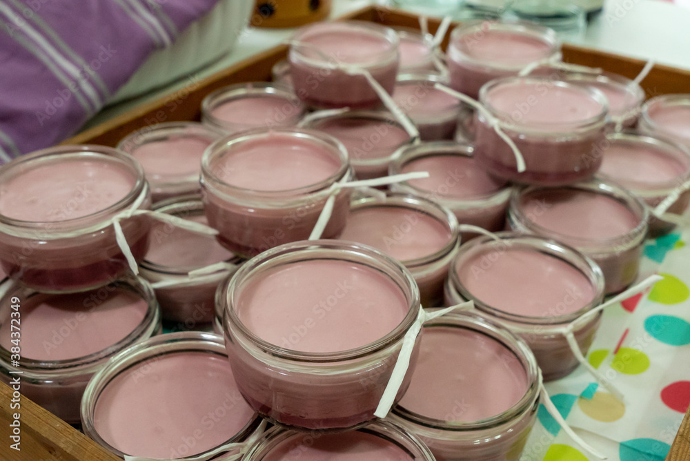 Red wine cream in dessert glasses with a ribbon around it Red wine cream in dessert glasses with a ribbon around it
