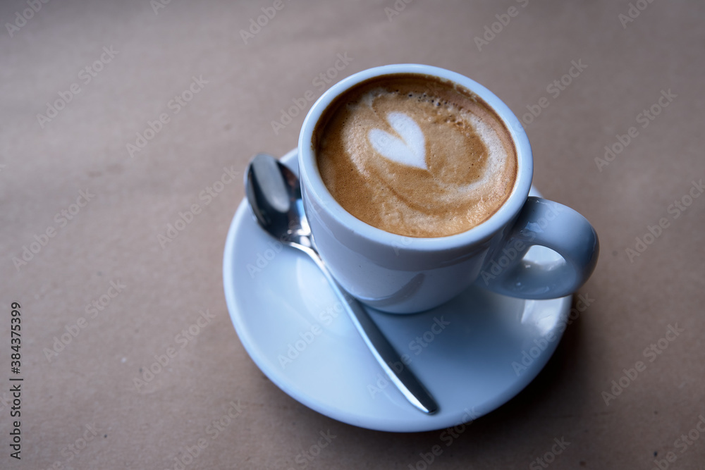 Fototapeta premium cup of coffee on the table