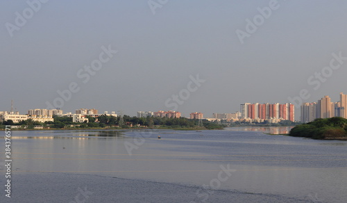 Chennai, Tamil nadu , India . Oct 07,2020.Huge modern new apartment buildings near OMR Road, Chennai city and beautiful scenic lake in front and this panorama photo was taken from ecr Road © Dinesh