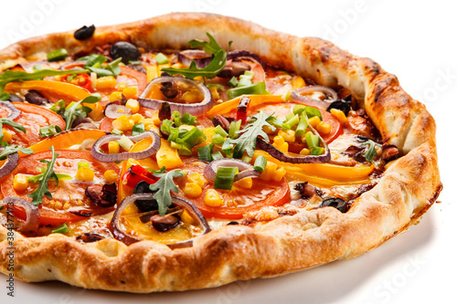Pizza with ham, mozzarella, champignon and corn on white background 
