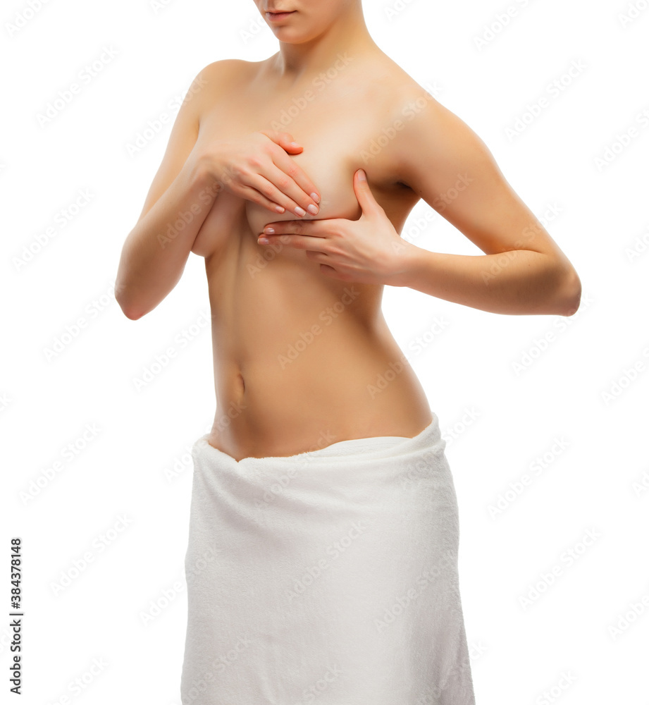 Woman examining breast isolated on white background Woman examining breast isolated on white background