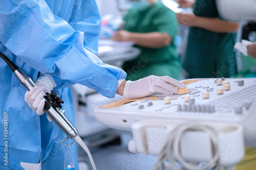 Tableau sur toile Cardiologist holding transesophageal ultrasound probe and use echocardiogram to