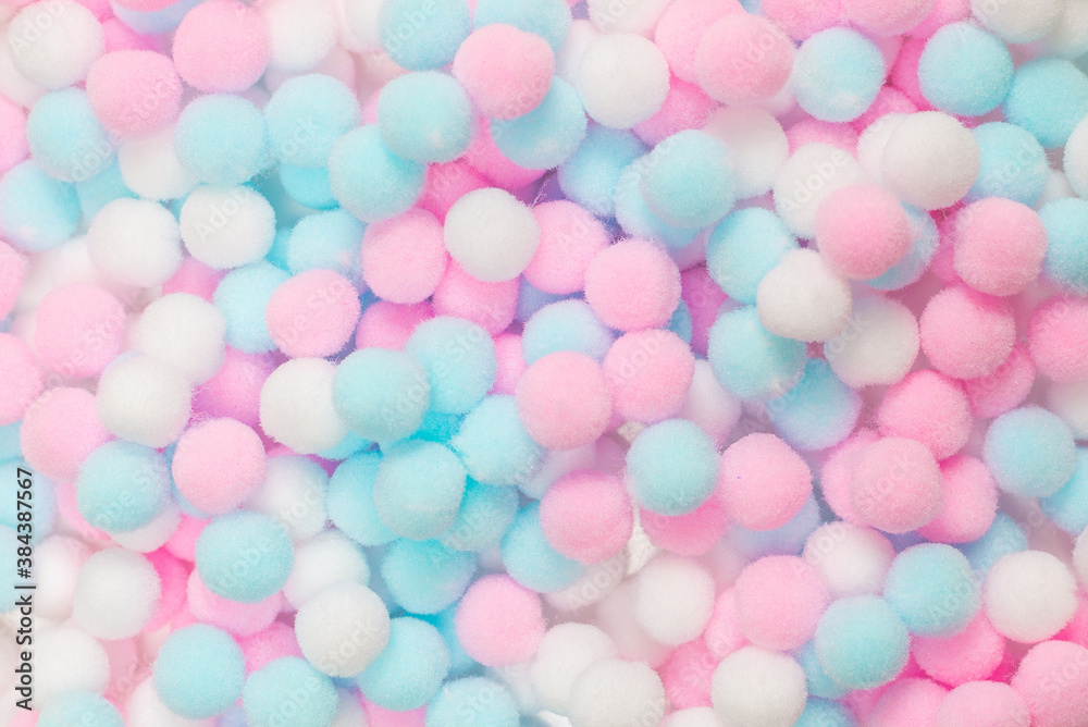 White, pink and blue soft pompons White, pink and blue soft pompons