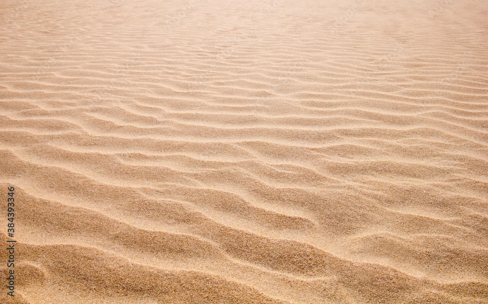 Beautiful nature background - Rippled sand at sunset time in Tangalle (Tangalla) beach, Sri Lanka island, South Asia Beautiful nature background - Rippled sand at sunset time in Tangalle (Tangalla) beach, Sri Lanka island, South Asia
