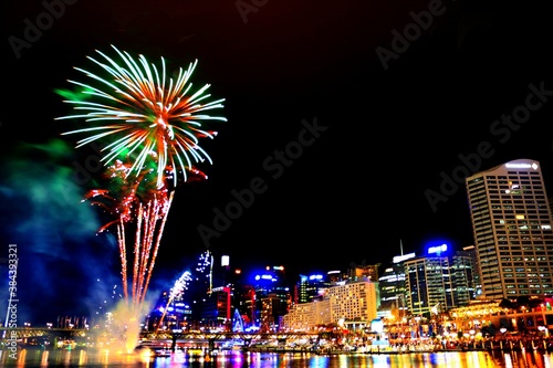 Fireworks celebration in the Darling Harbour Sydney Australia. See fabulous fireworks light up the Sydney night sky at Darling Harbour. photo