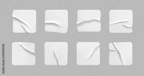 White square glued stickers mock up set. Blank white adhesive square paper or plastic sticker label with wrinkled, crumpled effect. Blank template label tags. 3d realistic vector
