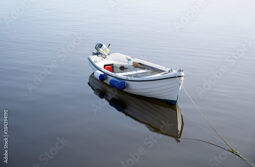 Fototapeta Naklejka Na Ścianę i Meble -  Boat in sea water for tranquility calm peace and mindfulness
