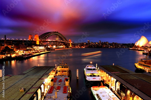 Circular Quay Sydney Australia at night from Circular Quay station. Circular Quay area is a opopular neighborhood for tourism and consists of walk ways, predestrian malls, park photo