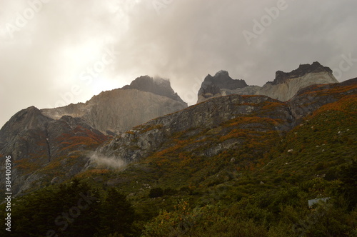 Hiking around the dramatic and windswept mountain landscapes of the Torres del Paine National Park in Patagonia, Chile