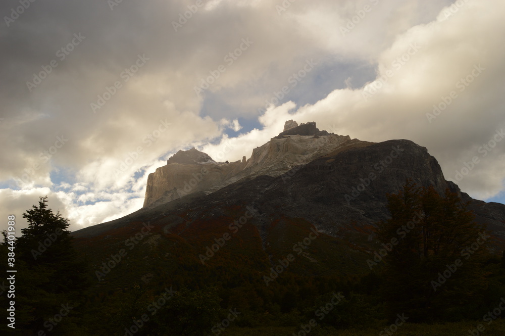 Hiking around the dramatic and windswept mountain landscapes of the Torres del Paine National Park in Patagonia, Chile Hiking around the dramatic and windswept mountain landscapes of the Torres del Paine National Park in Patagonia, Chile