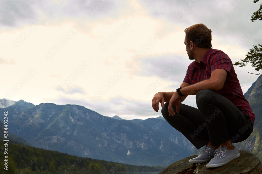 One man looking at peaceful nature landscape. One man looking at peaceful nature landscape.
