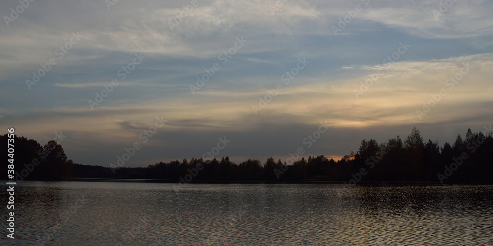 Autumn fishing on the lake, beautiful panorama.