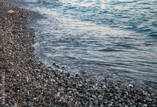 Beautiful view of the Black Sea coast with pebbles Sochi Russia.