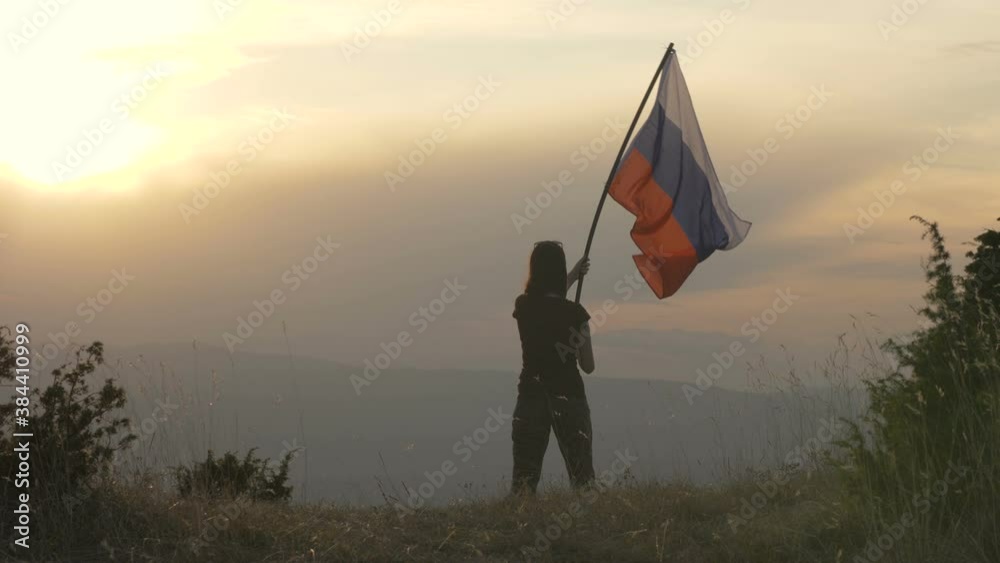 Russian patriots holding russian flag