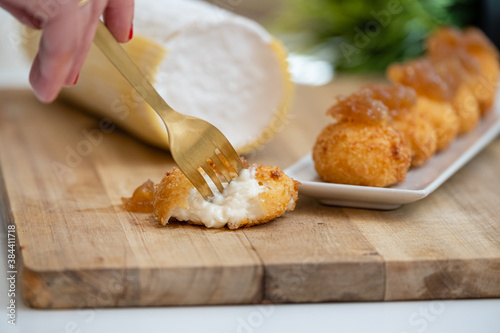 Tapas plate of Spanish ham and cheese croquettes with onions