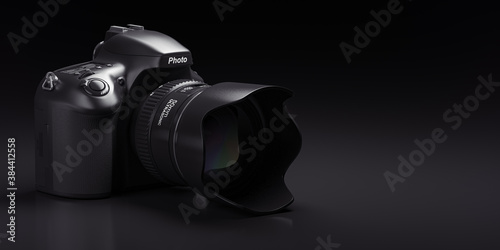 Professional digital photo camera on black background. photo