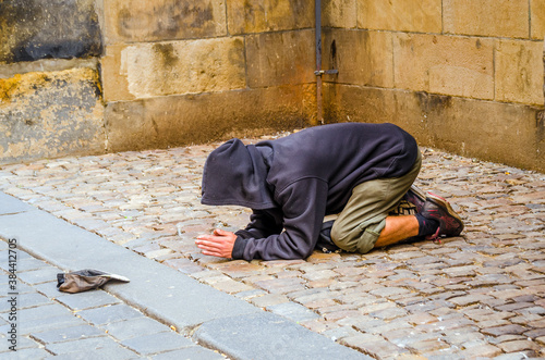 Prague, The Czech Republic: Unidentified beggar on the street. © Lukas