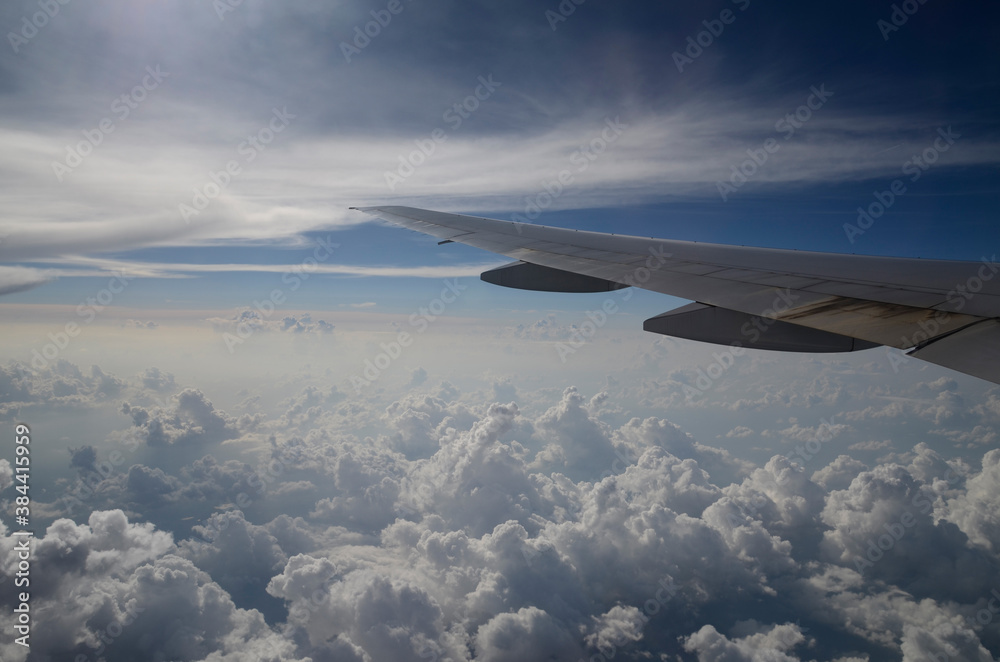 Flying above beautiful clouds in the sun Flying above beautiful clouds in the sun