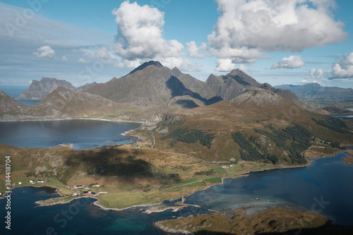 View from famous mountain on Lofoten Islands. Veiew over the fall colored islands. Pure nature appropriate for better immunity. Perfect getaway from covid-19 situation. Steep mountains at the back.