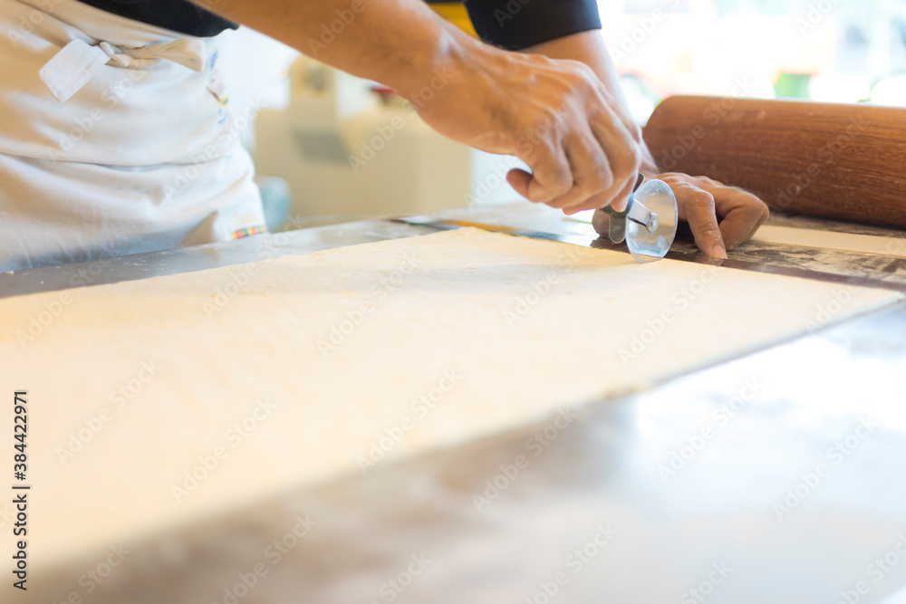 Hands baking dough with rolling pin on wooden table
Hand, Cooking, Dough, Bread, Bakery,Croissant Hands baking dough with rolling pin on wooden table
Hand, Cooking, Dough, Bread, Bakery,Croissant