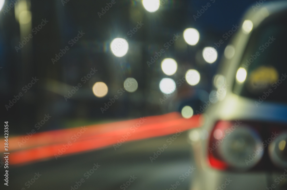 Blurred night city street traffic lights