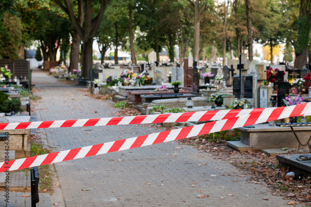 Fighting the pandemic. Closed cemetery due to COVID-19 SARS-CoV-2 outbreak. It is forbidden to visit the cemetery.