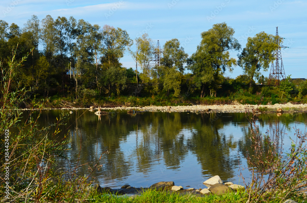 Obraz premium mountain river between sheer cliffs . blue clear water of the river.
