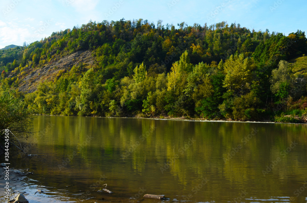 Fototapeta premium mountain river between sheer cliffs . blue clear water of the river.