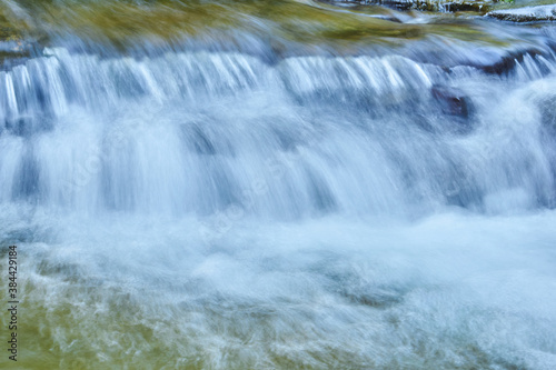 natural background - the jets of the waterfall are blurred in motion
