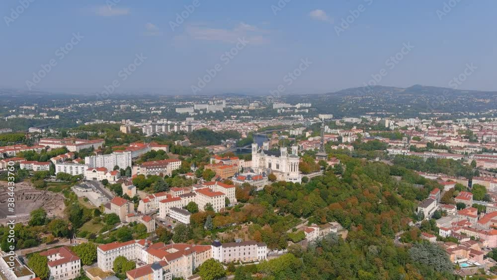 Lyon: Aerial view of historic city with hilltop Basilica of Notre-Dame de Fourvière (La Basilique Notre Dame de Fourvière) - landscape panorama of France from above, Europe Lyon: Aerial view of historic city with hilltop Basilica of Notre-Dame de Fourvière (La Basilique Notre Dame de Fourvière) - landscape panorama of France from above, Europe