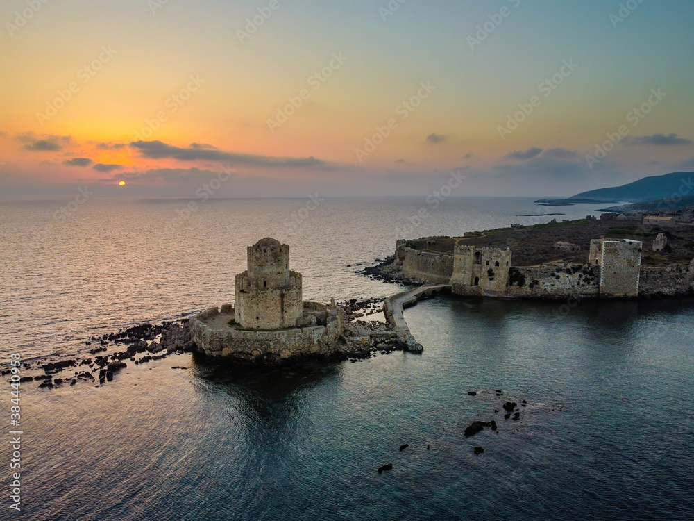 Aerial panoramic view of Methoni castle at dusk, a Venetian Fortress, Greece