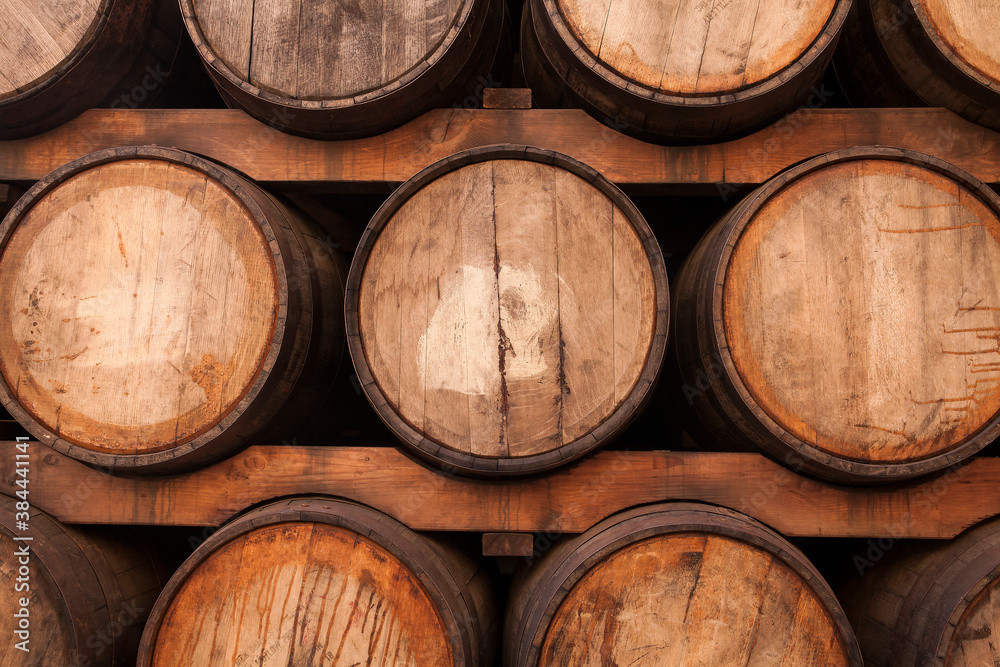Closeup of rustic, wooden tequila barrels
