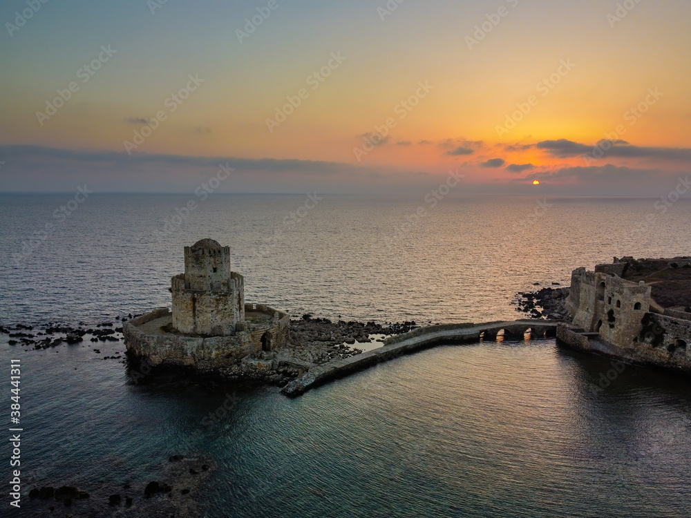 Aerial panoramic view of Methoni castle at dusk, a Venetian Fortress, Greece