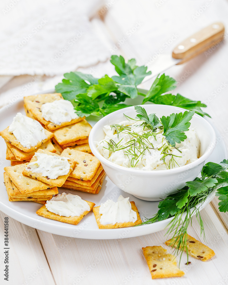 cream cheese with crackers on white background cream cheese with crackers on white background