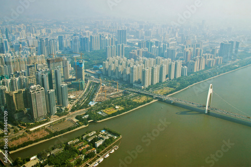Guangzhou town and Pearl river view from windows of Canton tower © scullery