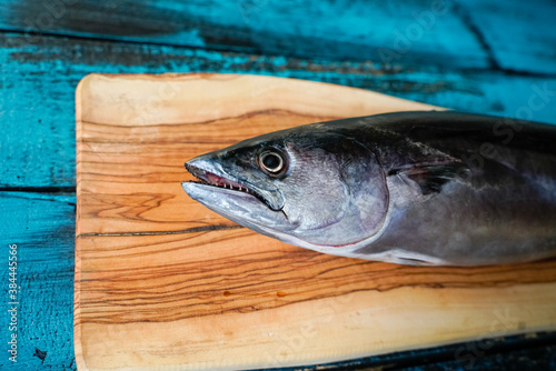 Fototapeta Naklejka Na Ścianę i Meble -  fresh raw tunny fish on blue old table