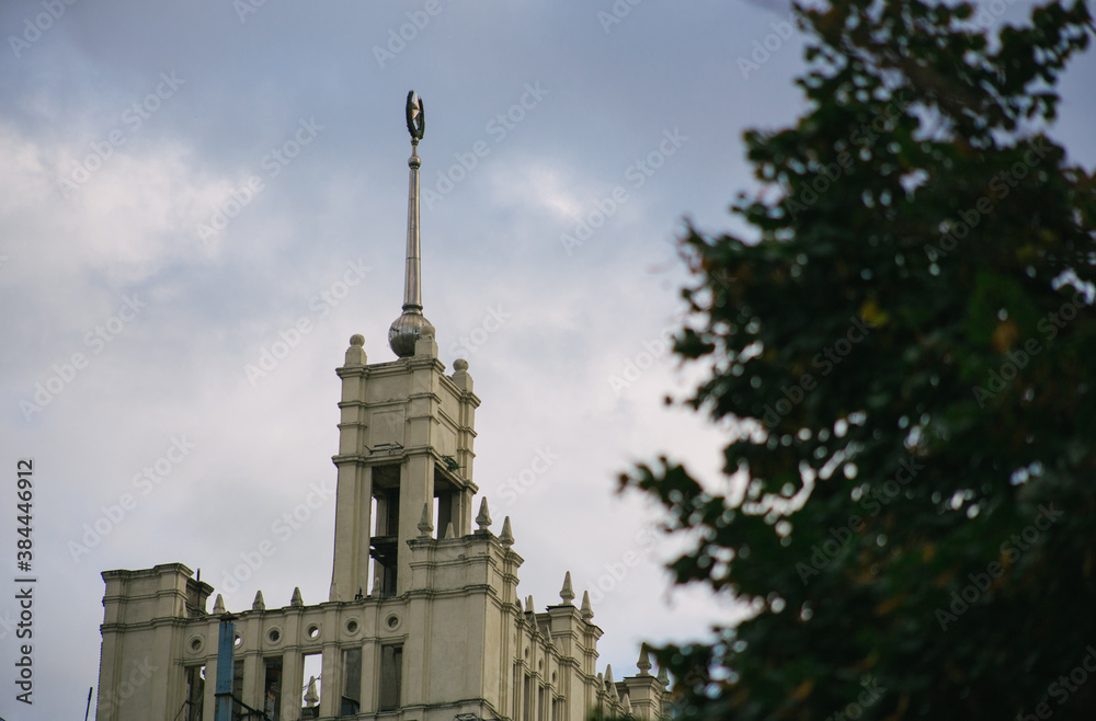 House with a spire in the Stalinist Empire style in the center of kharkov