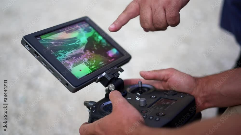 Closeup of professional drone controller. Pilot flying drone
