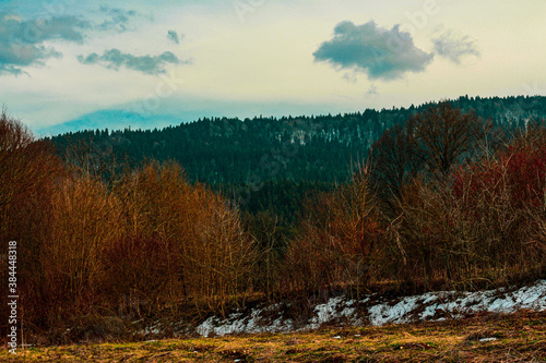 Scenic autumn winter mountain landscape, blue sky