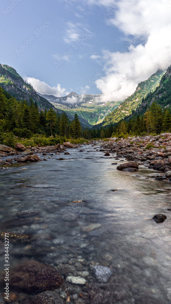 The mountains and nature of the Anzasca valley, One of the most beautiful valleys in the Alps, near the town of Macugnaga, Italy - July 2020.