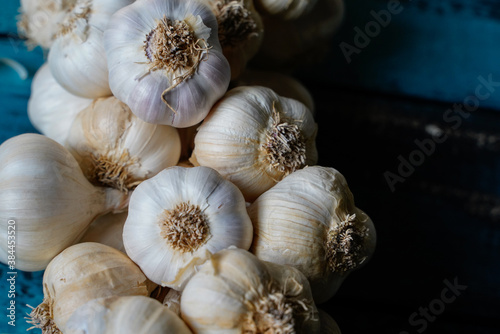garlic bunch on a blue wooden table
