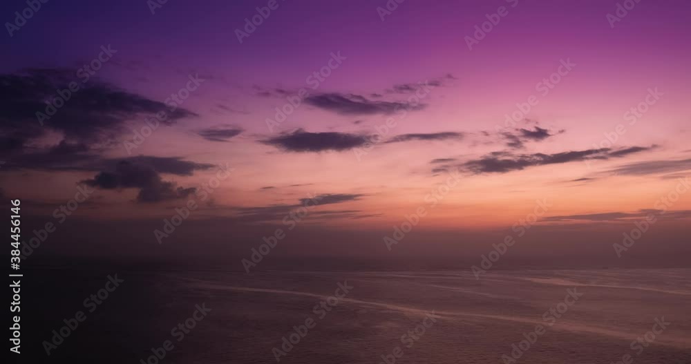 Sun is setting on sea with clouds. Fast time movement. Earth rotation evidence Sun is setting on sea with clouds. Fast time movement. Earth rotation evidence